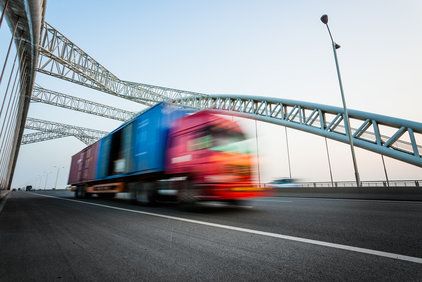 Blurred truck on highway